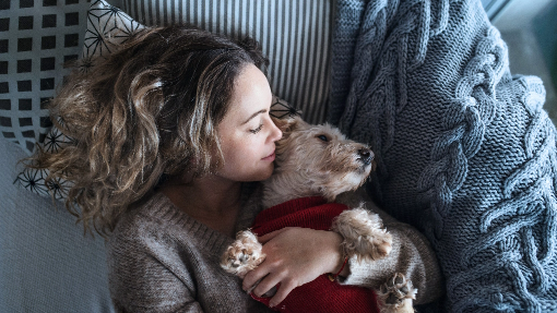 Woman holding a dog