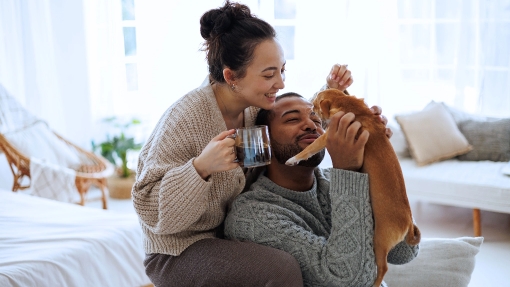 Couple Holding their Puppy